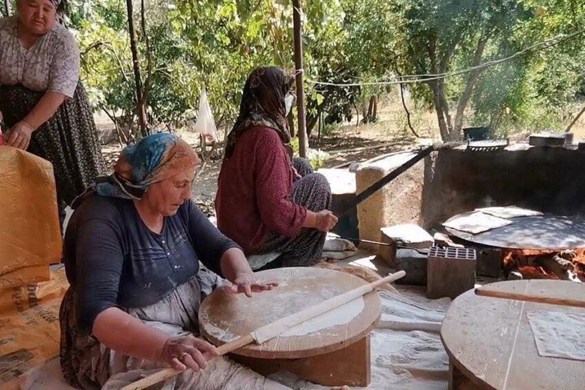 Local flatbread prepared during a village stop 3
