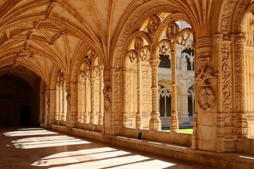 A cathedral's interior with arched ceilings and detailed stonework. 2