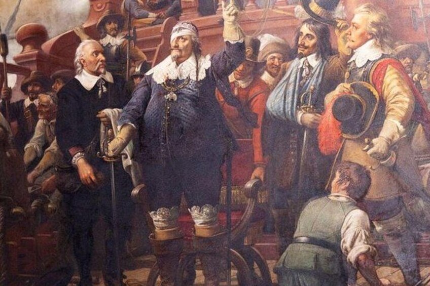 A historical scene with people in period clothing, a man in a blue coat holding a sword, and another in a red coat with a hat. 2