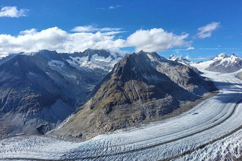 A glacier with a mountain range in the background. 3