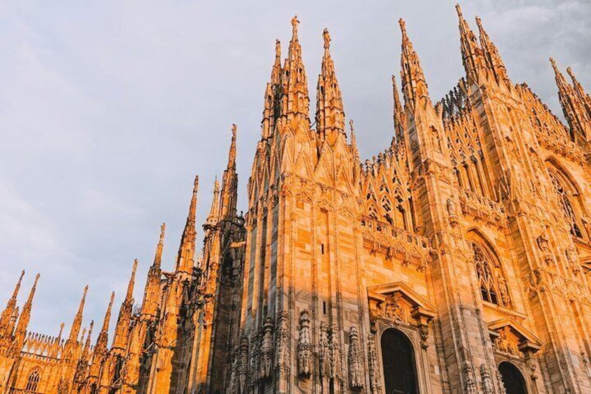 A Gothic cathedral with intricate spires and detailed stonework. 1