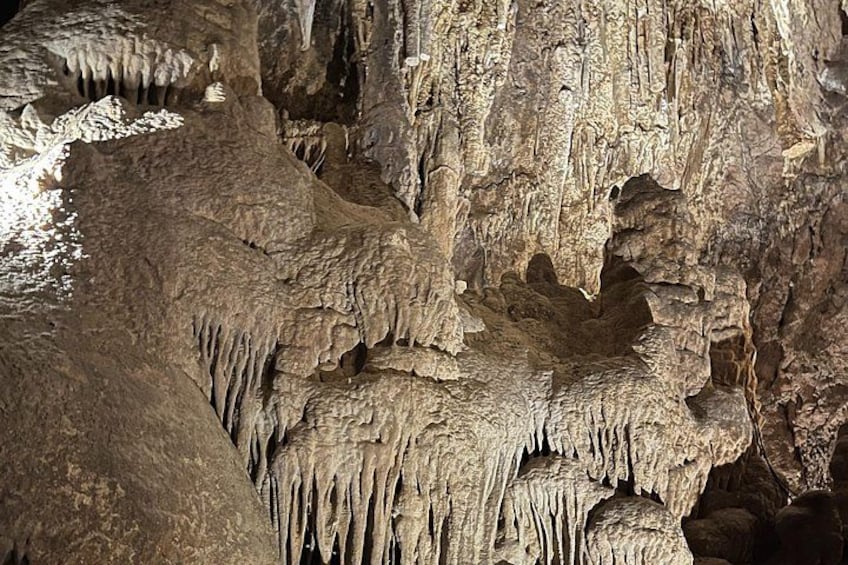 A cave with stalactites and stalagmites. 2