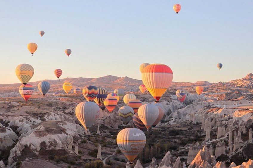 Soaring Above Cappadocia's Fairy Chimneys at Sunrise 4