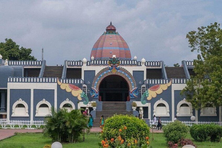 A large building with a colorful dome and ornate arches. 2