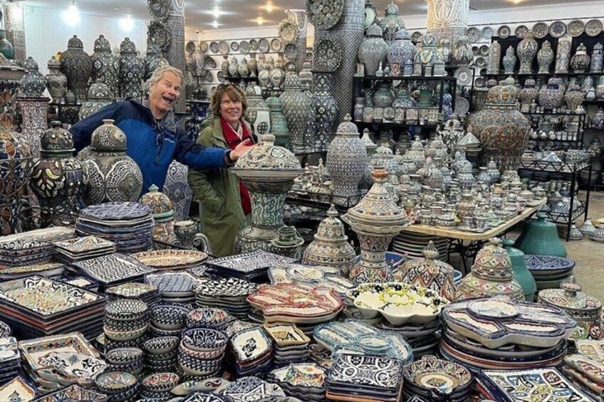 A store with various ceramic items on display. 1