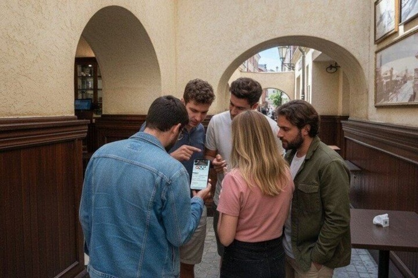 A group of people standing in a narrow alleyway with arched doorways and wooden paneling. 4