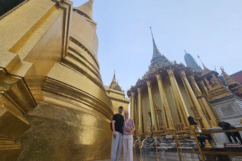A golden temple with intricate architecture and a clear sky. 4