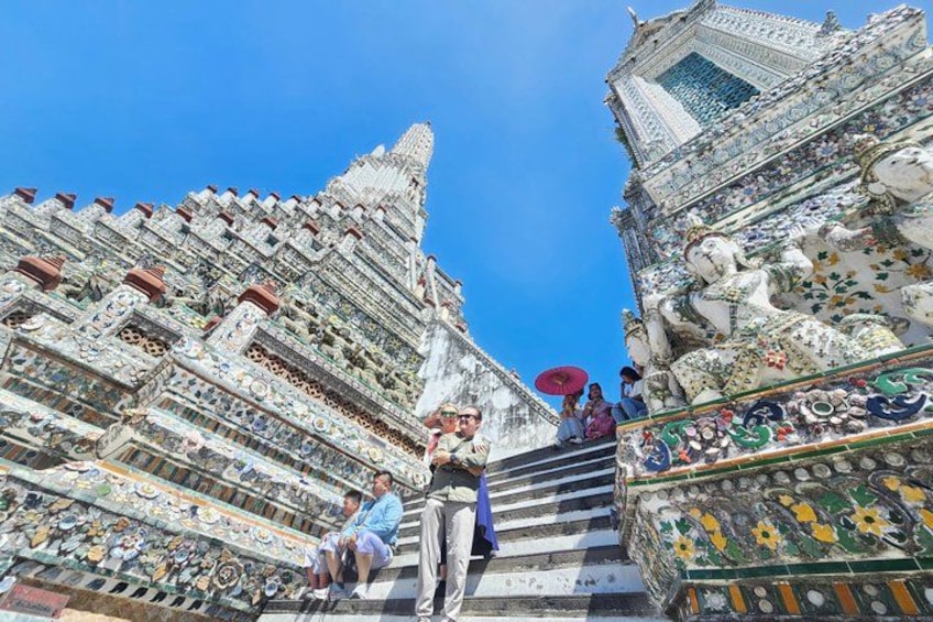 A temple with intricate tile work and statues. 3