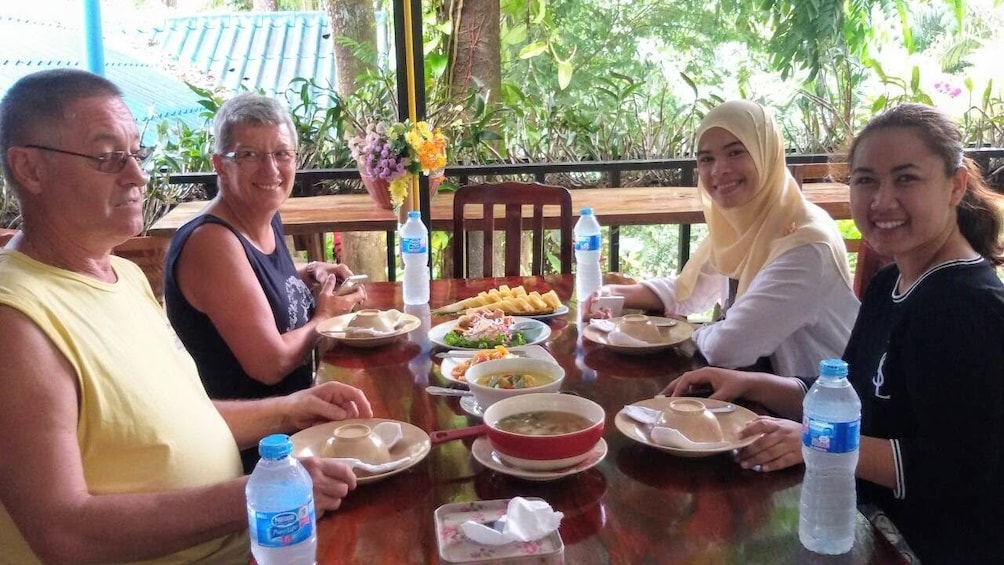 Family eating lunch in Thailand