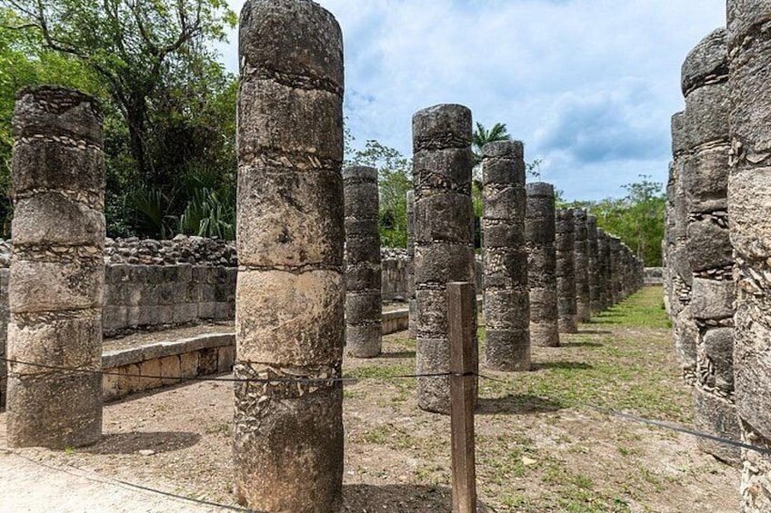 Ancient stone pillars in a historical site. 2