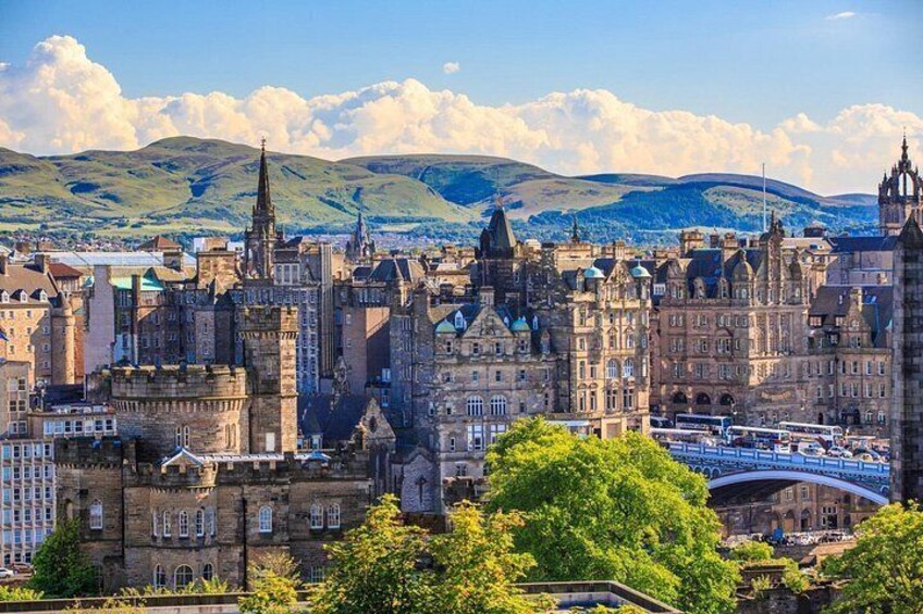 A historic cityscape with prominent architecture, including a cathedral and a bridge. 3
