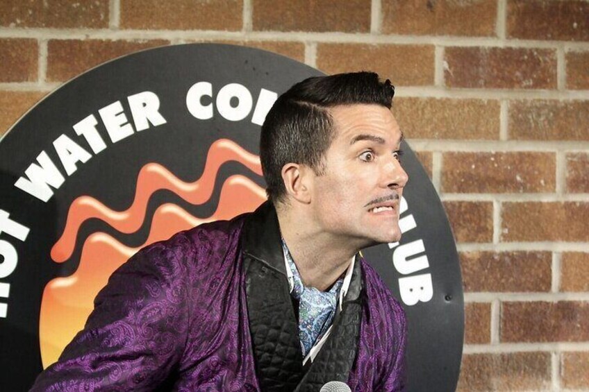 A person in front of a sign that reads "WATER CLUB". 3
