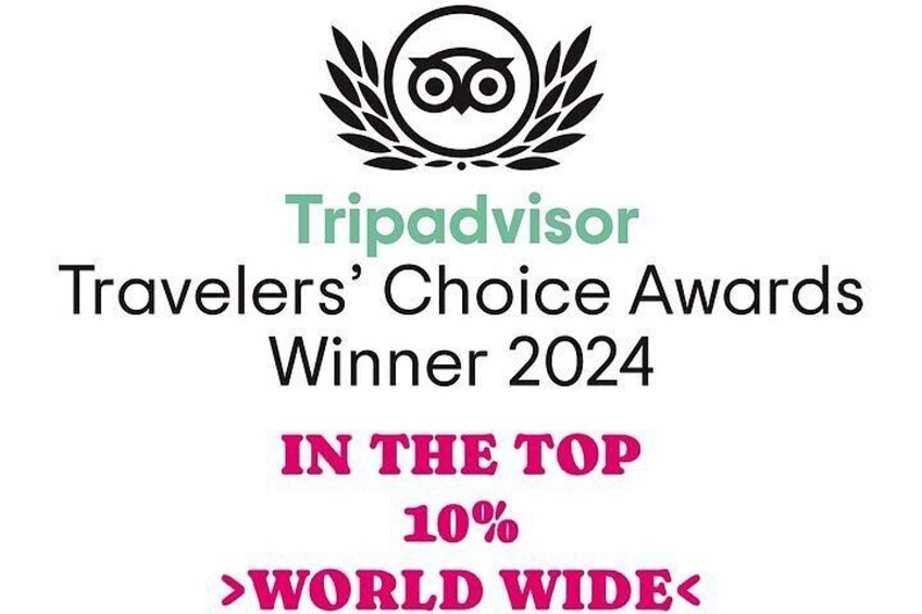 Logo di TripAdvisor con testo che indica 'Vincitore dei Travel Awards 2024' e 'TRA IL 10% SUPERIORE A LIVELLO MONDIALE'. 2