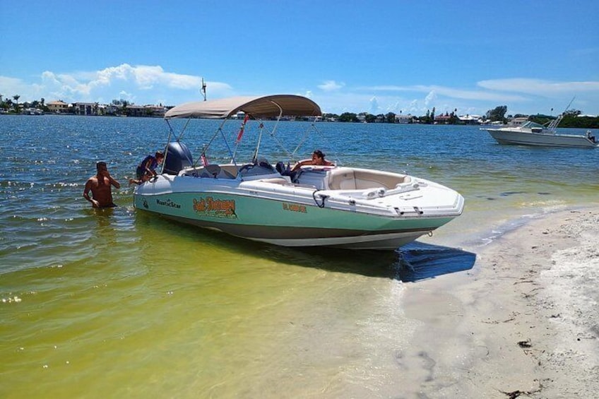 Private Clearwater boat tours with Captain Clearwater on Salt Therapy. USCG Master Captain, small groups, dolphins, sandbars, islands, and smooth sunset rides. Boat Like a Local. 3