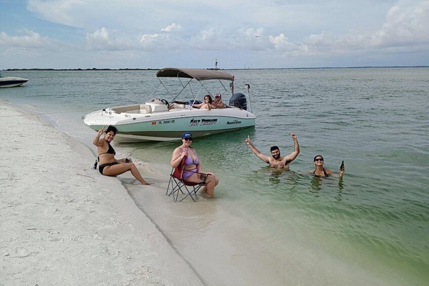 Private Clearwater boat tours with Captain Clearwater on Salt Therapy. USCG Master Captain, small groups, dolphins, sandbars, islands, and smooth sunset rides. Boat Like a Local. 2