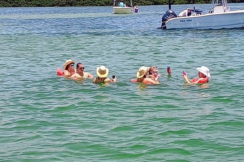 Private Clearwater boat tours with Captain Clearwater on Salt Therapy. USCG Master Captain, small groups, dolphins, sandbars, islands, and smooth sunset rides. Boat Like a Local. 5