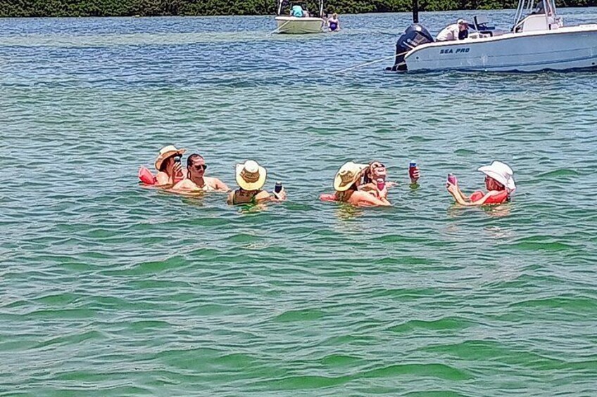 Private Clearwater boat tours with Captain Clearwater on Salt Therapy. USCG Master Captain, small groups, dolphins, sandbars, islands, and smooth sunset rides. Boat Like a Local. 3