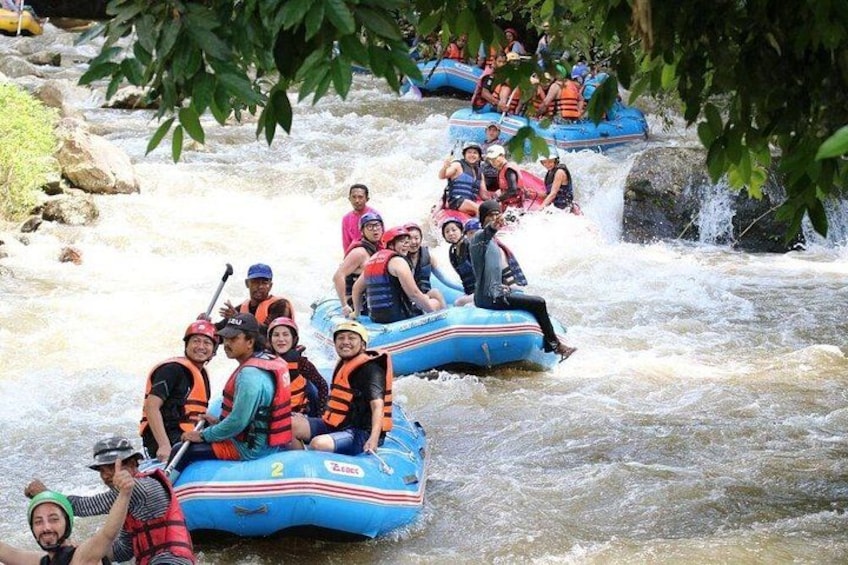 People rafting down a river. 5