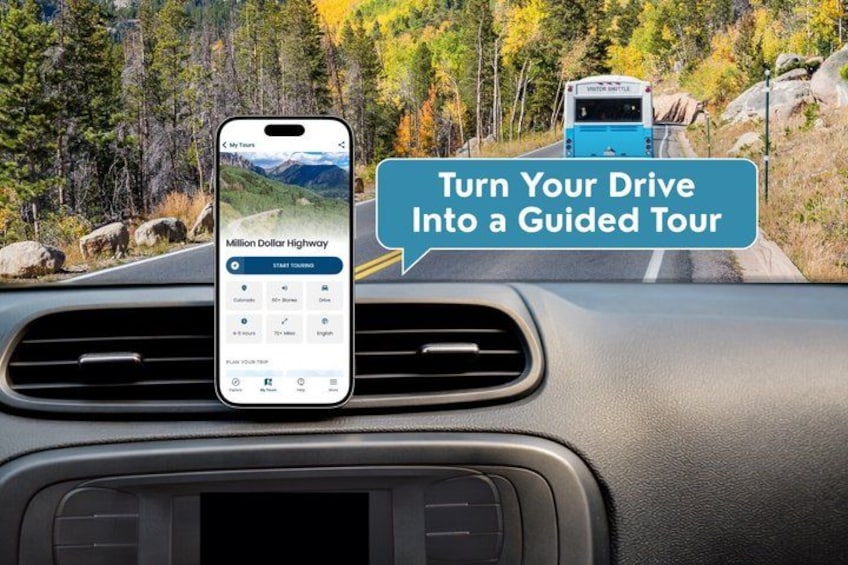 A smartphone mounted on a car dashboard displaying a guided tour app. 1
