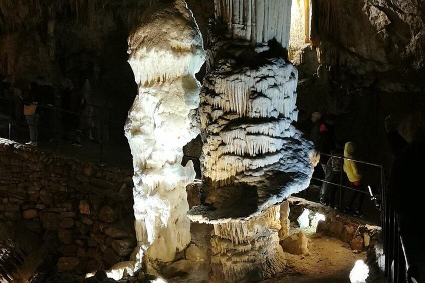 A cave with stalactites and stalagmites. 1