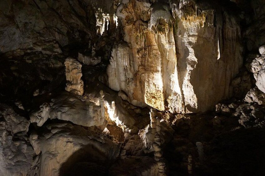 A cave with stalactites and stalagmites. 2