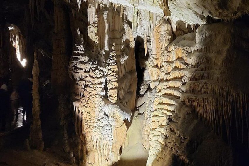 A cave with stalactites and stalagmites. 5