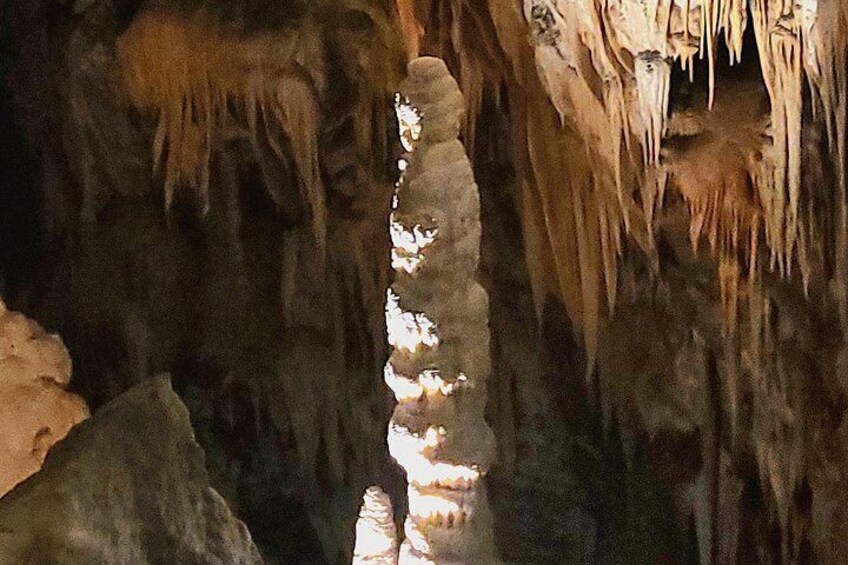 A stalactite formation in a cave. 3