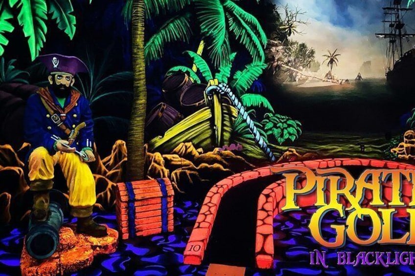 Un entorno de temática pirata con un personaje pirata, un barco y un paisaje tropical. 4