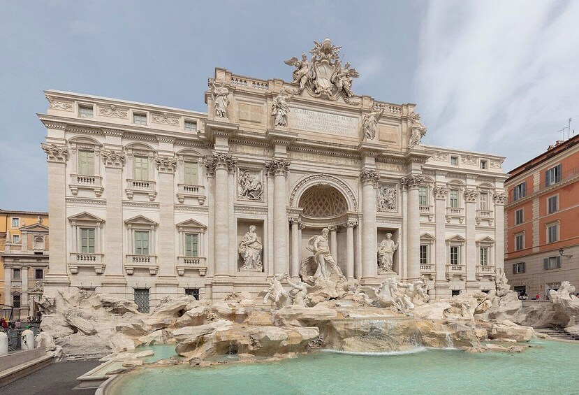 The Trevi Fountain with Baroque architecture and sculptures. 5