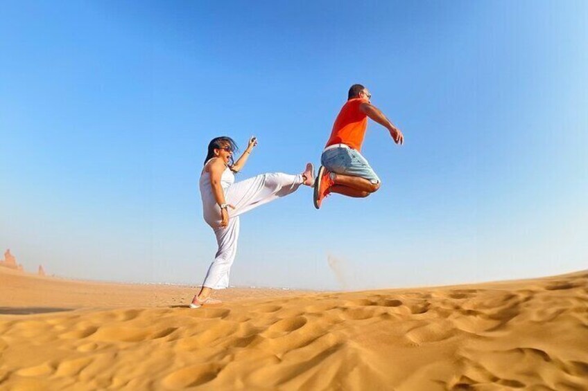 Evening Desert Safari Camel, Falcon, Sandboarding BBQ & Shows 5