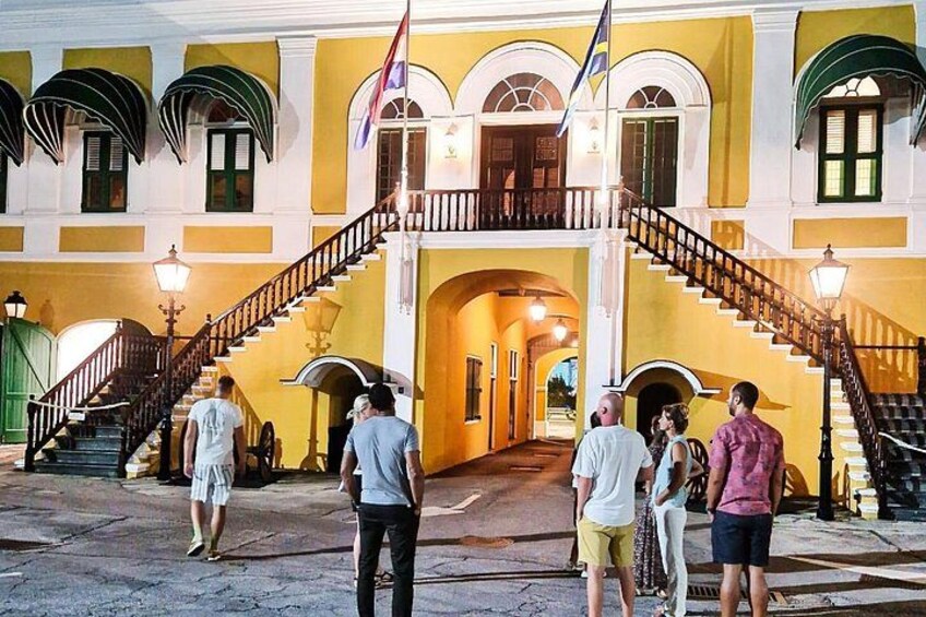 The Governor’s Seat inside the historic Rif Fort, beautifully illuminated at night — where colonial history meets the warm Caribbean breeze. 3