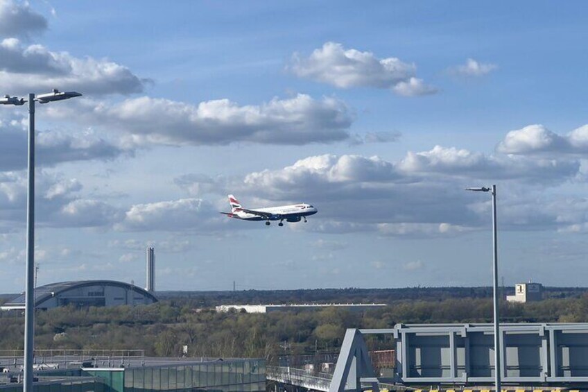 An airplane landing at an airport. 5