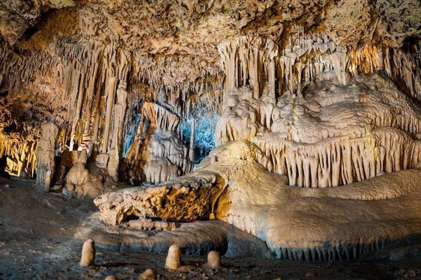 A cave with stalactites and stalagmites. 2