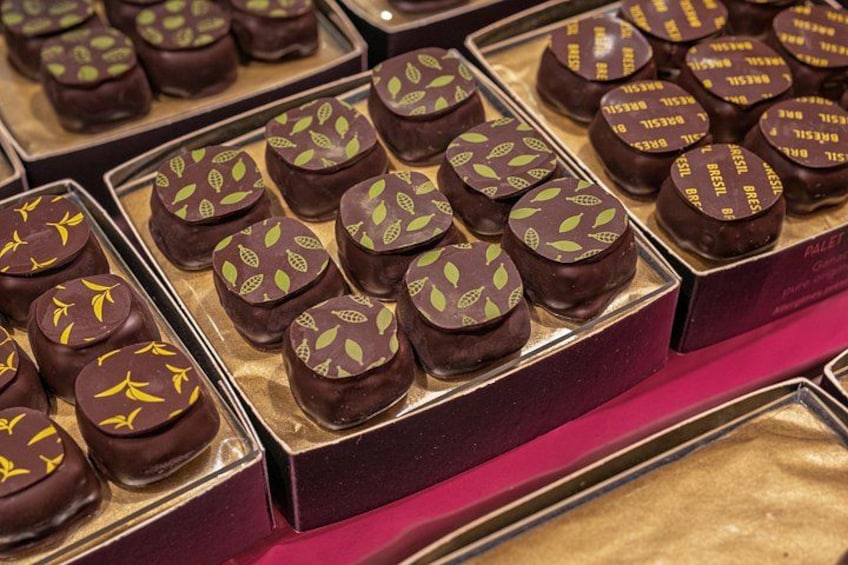 A display of assorted chocolates in boxes. 5