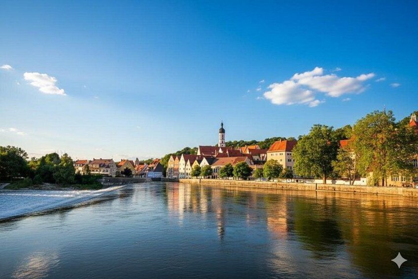A river with buildings and trees along the banks. 2