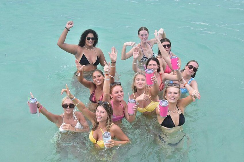 A group of people in a swimming pool. 2