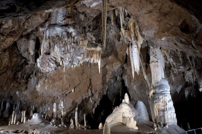 A cave with stalactites and stalagmites. 5