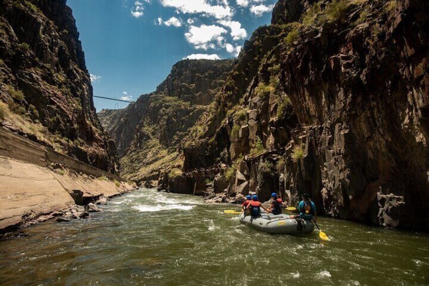 A river with a group of people rafting. 4
