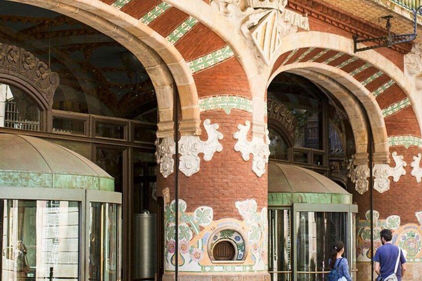 A building with ornate brickwork and decorative arches. 4