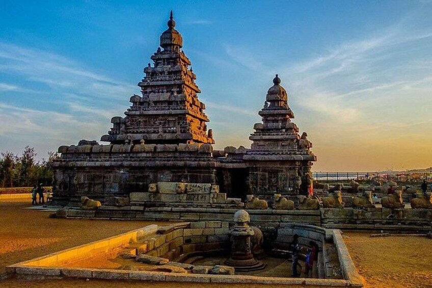 A temple complex with tiered structures and a central shrine. 4
