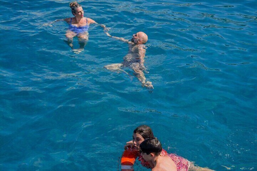 People swimming in a pool. 4