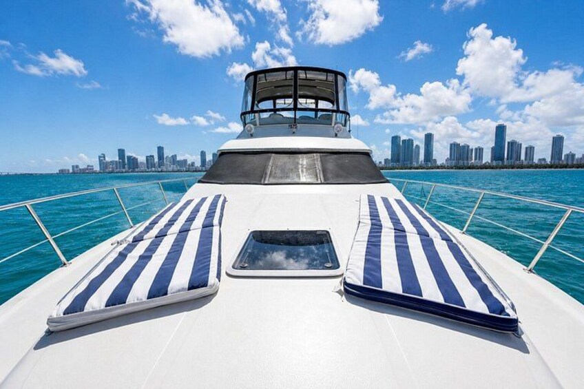 A boat deck with a city skyline in the background. 4