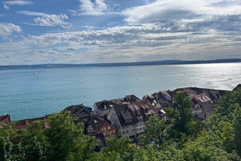 A coastal town with houses and a body of water. 3