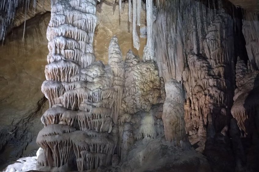 A cave with stalactites and stalagmites. 4