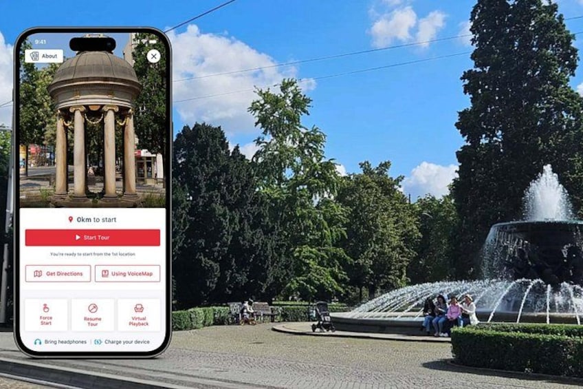 A smartphone displaying a map with a monument and a fountain. 1