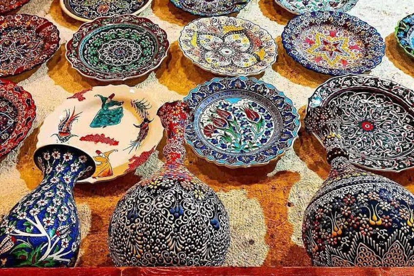 A collection of intricately designed ceramic bowls and vases. 2