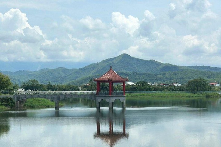 Encircled by mountains, Meinong Lake reflects the blue sky and lush green fields like a mirror. 2