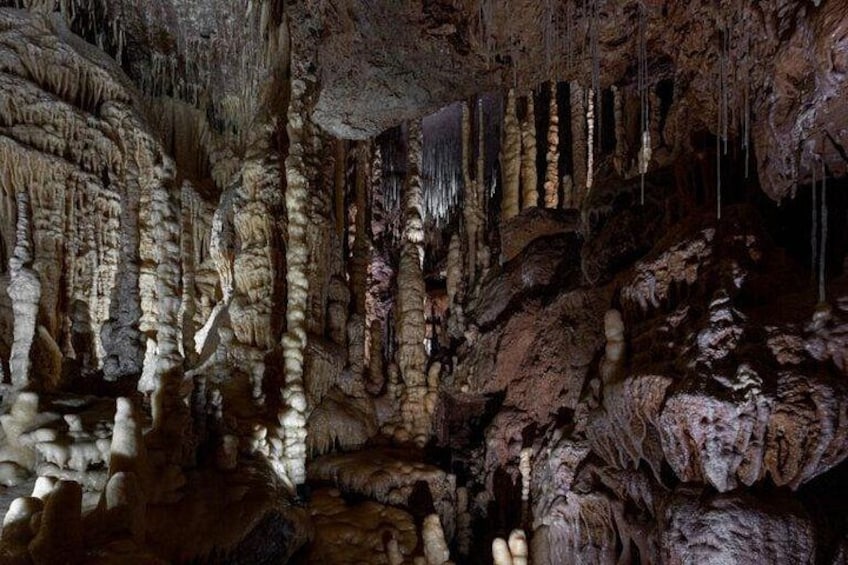 A cave with stalactites and stalagmites. 3