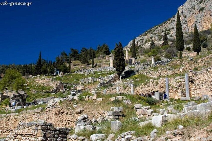 A hillside with ancient ruins and tombs. 4