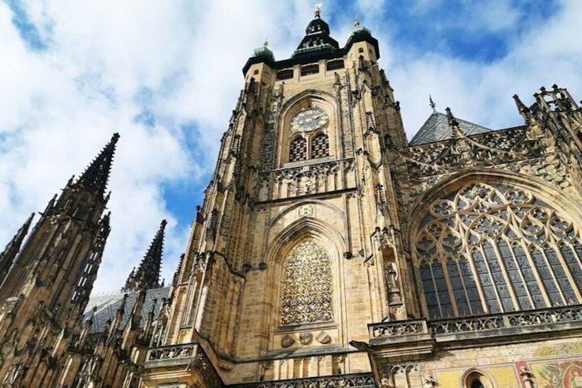 A Gothic cathedral with intricate stonework and a large rose window. 3